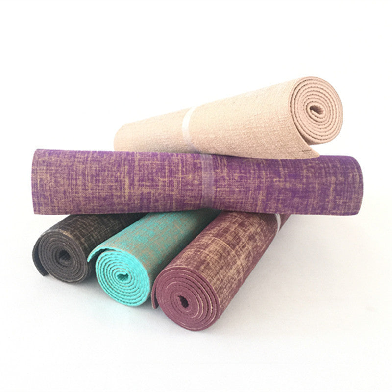 Eco-friendly sackcloth yoga mats in various colors, rolled and stacked. Made from jute and PVC with a 5mm thickness for fitness and sports use.