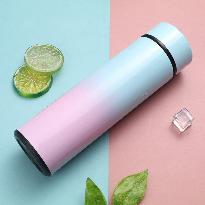 Stylish pink and blue gradient stainless steel vacuum flask with temperature display, perfect for travel and daily use. Keeps drinks hot or cold for hours.