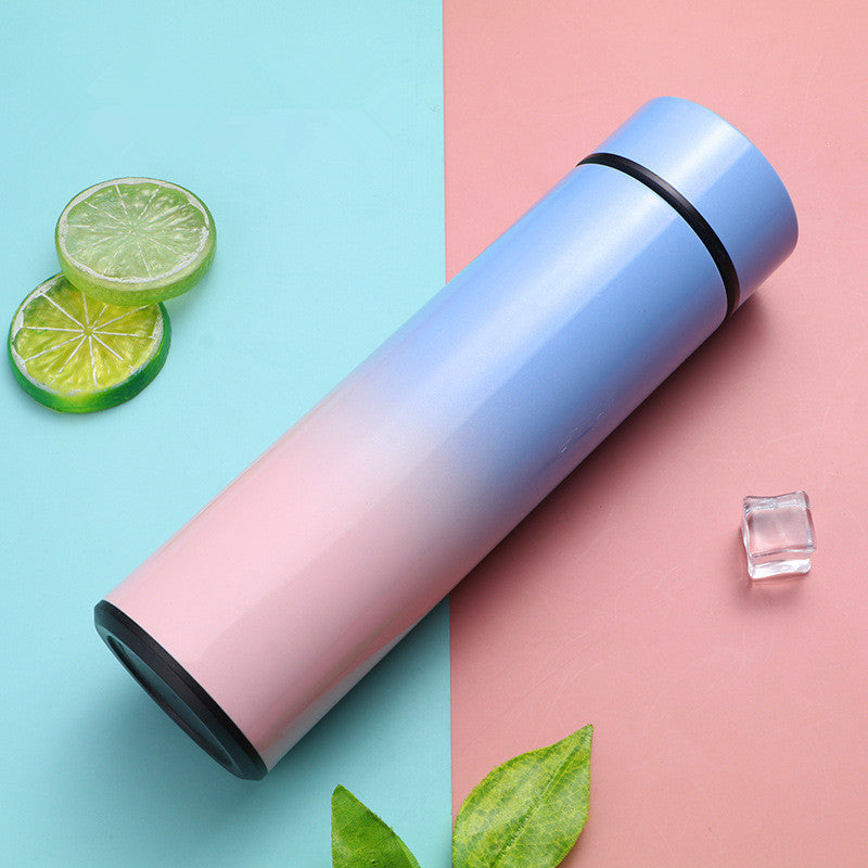 Blue and pink gradient stainless steel vacuum flask with temperature display, ideal for travel, coffee, and soup. Keeps beverages hot or cold for hours.