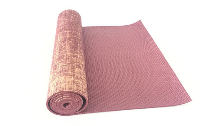 Maroon sackcloth yoga mat partially unrolled, featuring a durable jute surface and textured PVC backing. Great for fitness and sports activities.