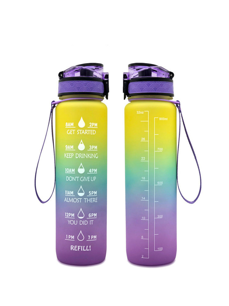 Yellow and purple gradient 1000ml water bottle with time markers, flip-top lid, and wrist strap for convenient hydration.