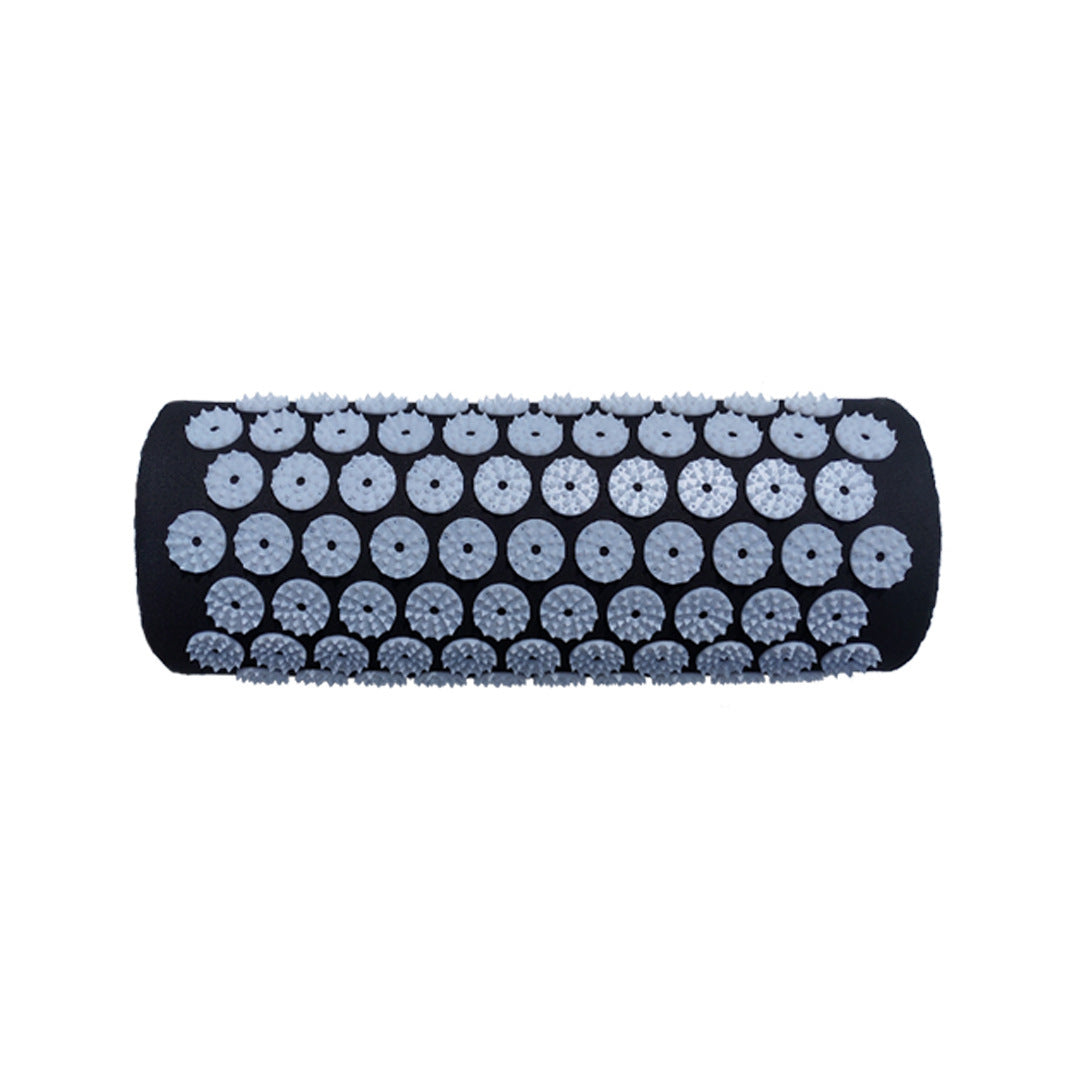 Black acupuncture pillow with pressure point nodes for neck and head relaxation. Ideal for yoga, massage, and stress relief.