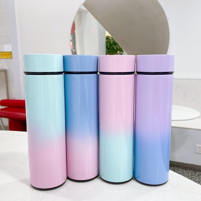 Set of four gradient stainless steel vacuum flasks with temperature display, ideal for travel, coffee, and soup storage. Stylish and insulated for 6-12 hours.