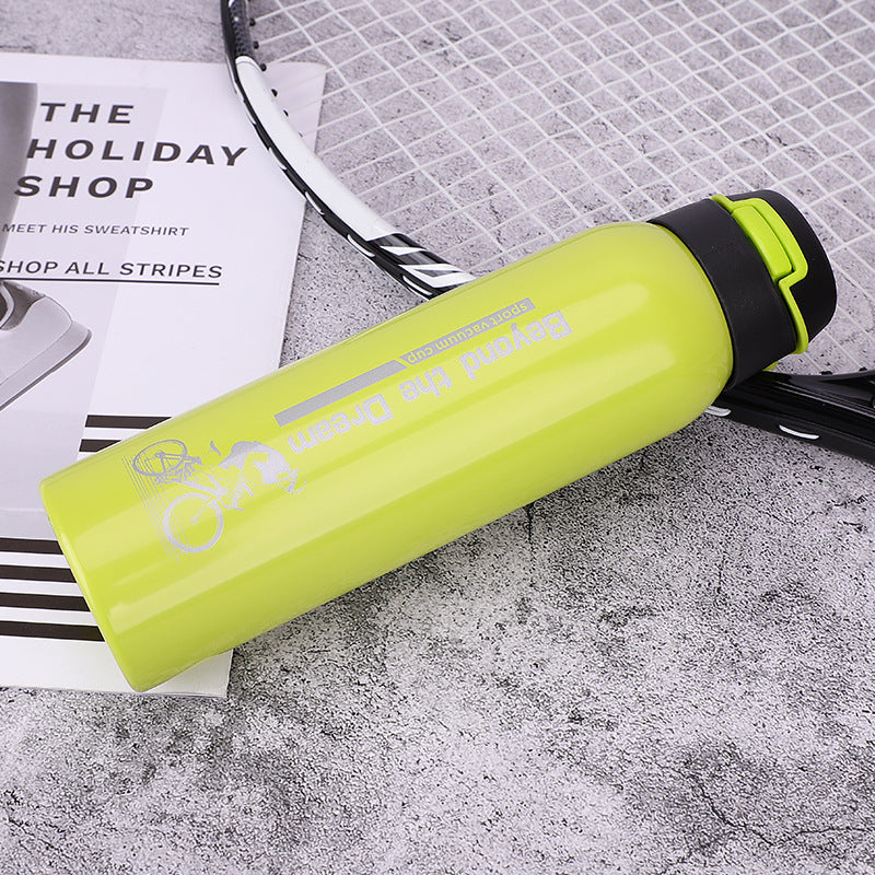 Yellow stainless steel bike water bottle with 'Beyond the Dream' design. Double-walled insulation keeps beverages hot or cold for extended periods.