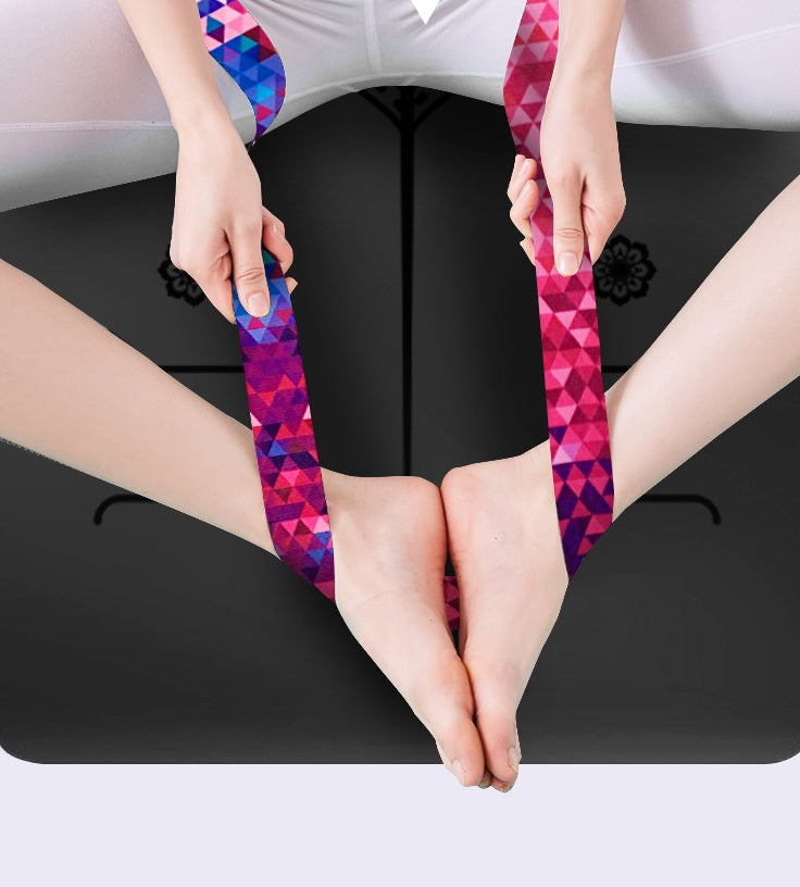 Yoga strap used for foot stretching exercises. Strong and flexible cotton material with a stylish pink and purple geometric design.