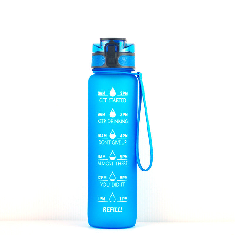 Bright blue 1000ml water bottle with motivational time markers, leakproof lid, and wrist strap for daily hydration.